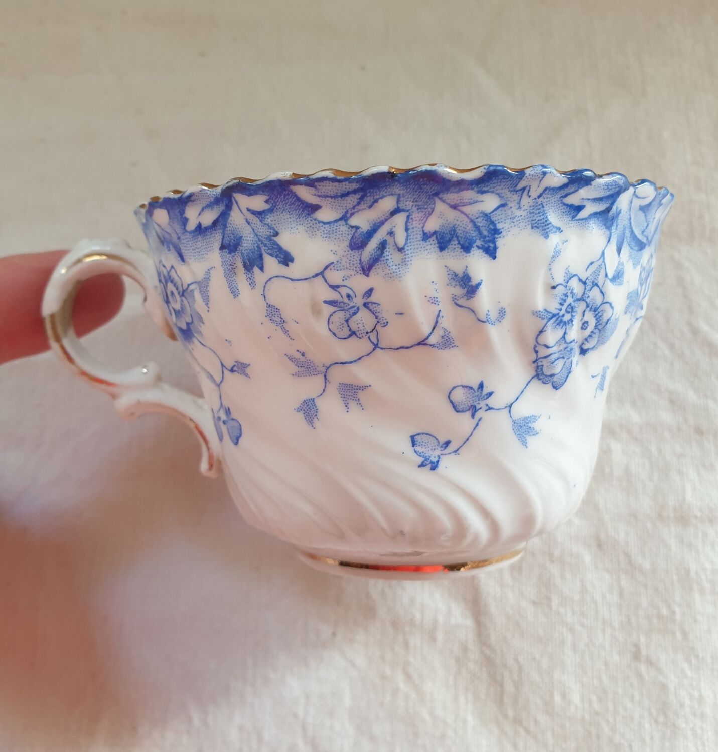 Trio of fine porcelain cups