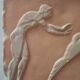 Bas-relief in the antique style featuring athletes.