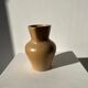 Small pitcher in light beige sandstone