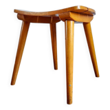 Small curved wooden stool