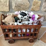 Small wicker wheeled cart
