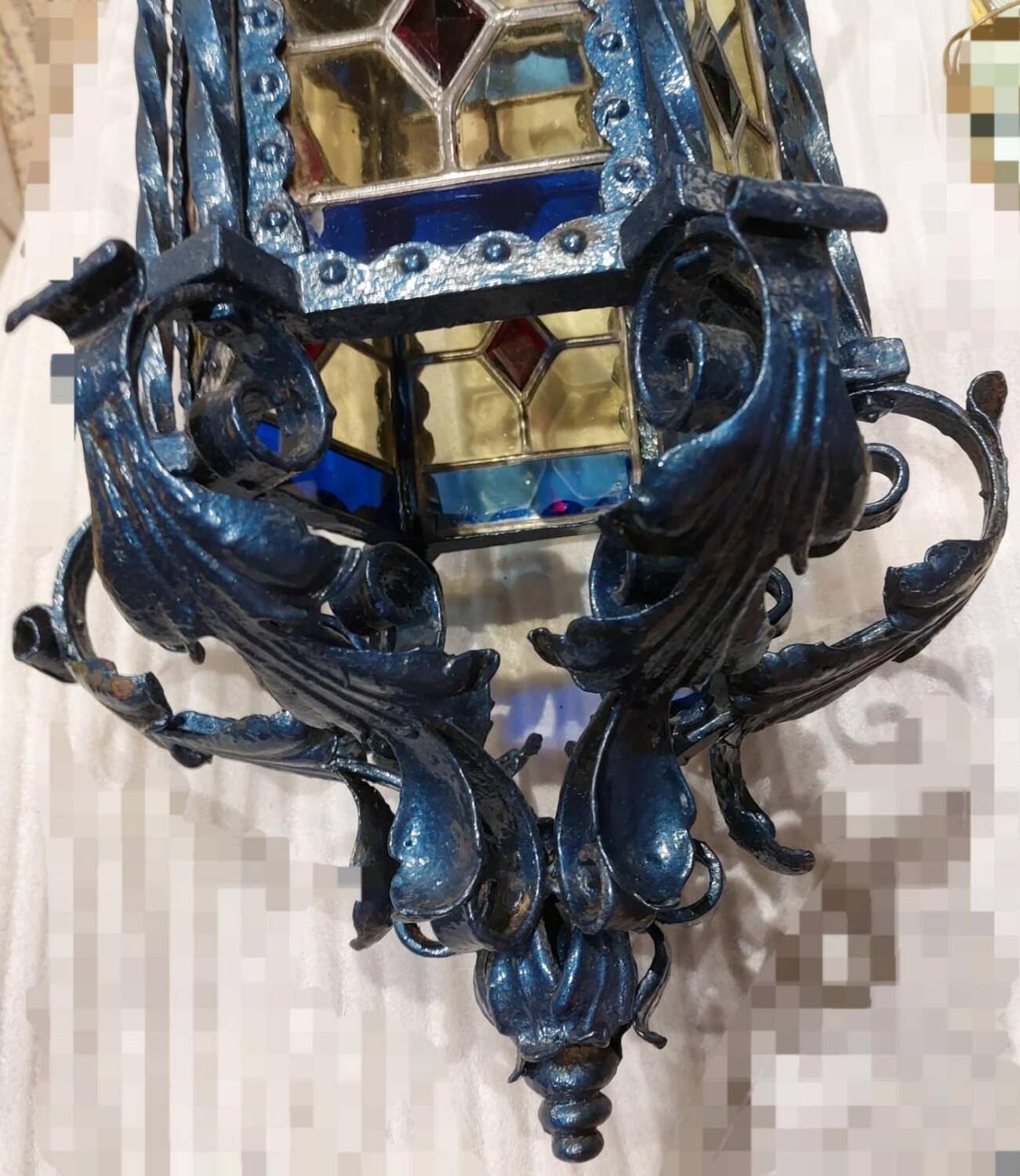 Large antique wrought iron lantern with stained glass windows