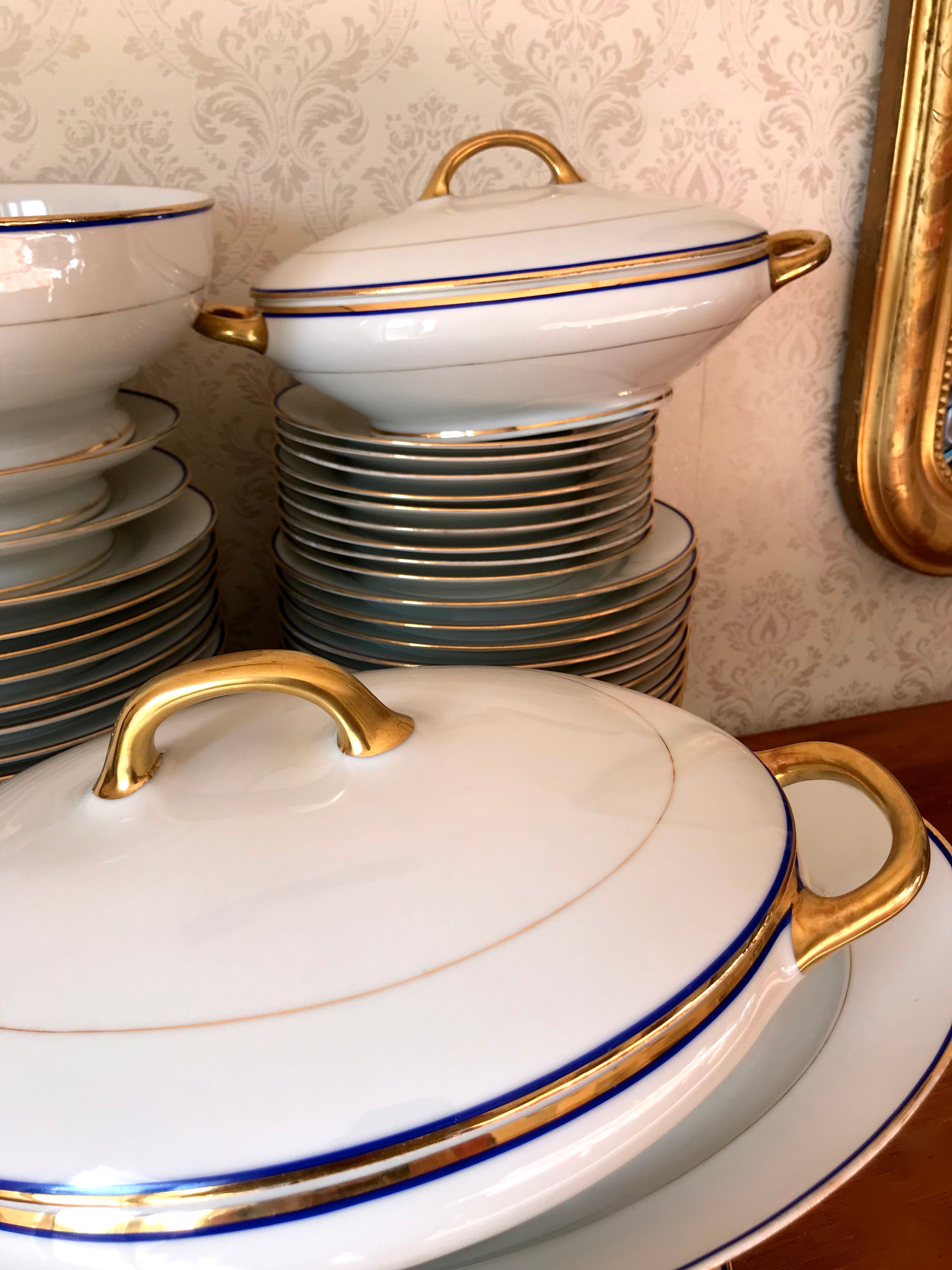 table service art deco limoges porcelain white border blue and gold 61 pieces signed