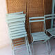 6 antique folding garden chairs made of painted wood and metal.