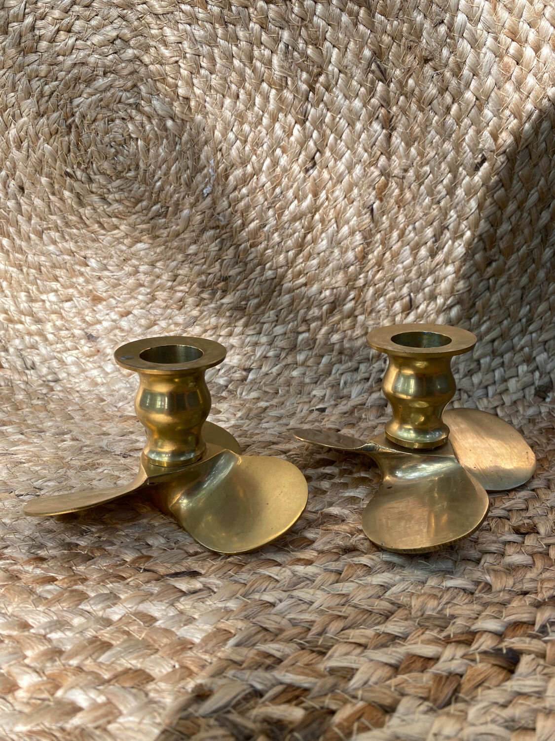 Pair of brass candle holders, helix shape