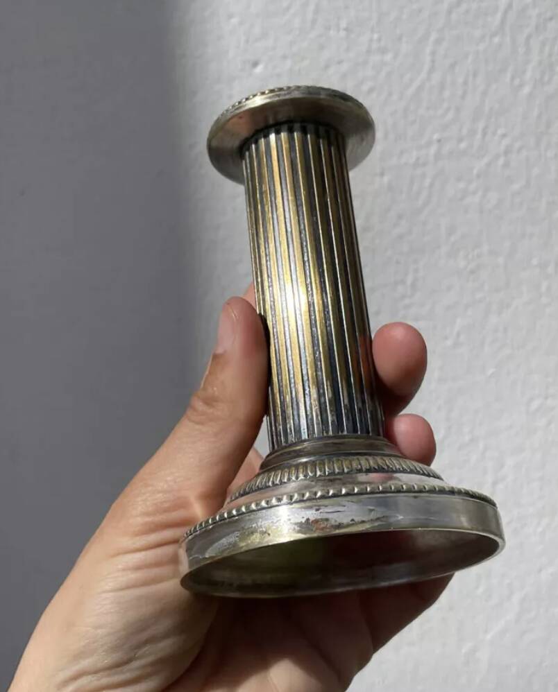 Pair of 19th-century fluted silver-plated metal candlesticks