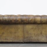 2.5 seater leather chesterfield sofa in a moss green color