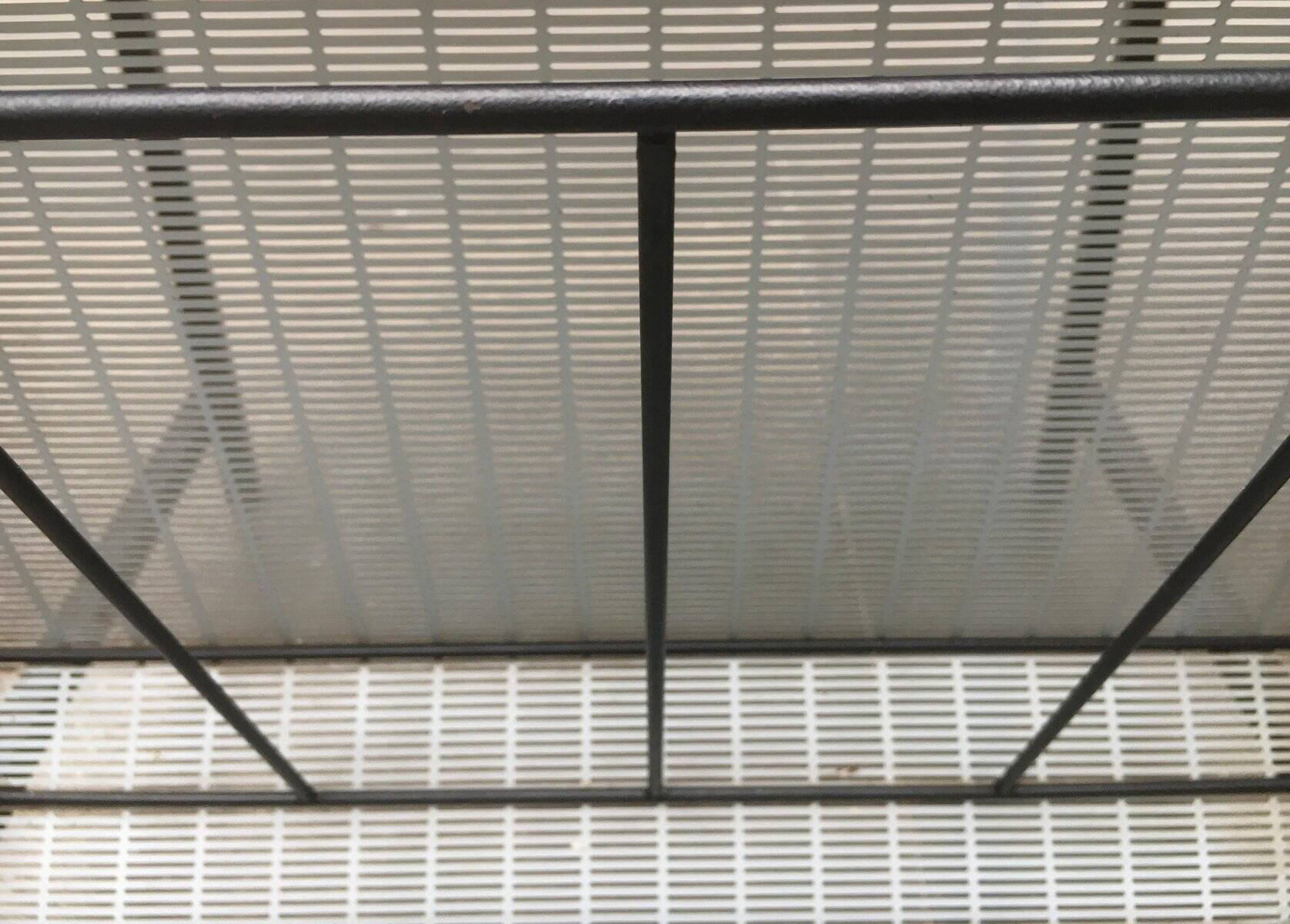 Mid-century teak side table with magazine rack.