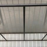 Mid-century teak side table with magazine rack.