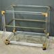 Rolling acrylic and brass serving table – 1960