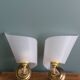 Golden metal appliques and plexiglass perspex in the style of Maison Lunel or Guariche.