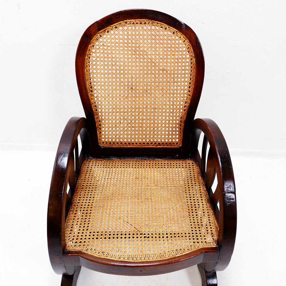 Art Deco armchairs in wood, with cane seat and backrest, circa 1930.