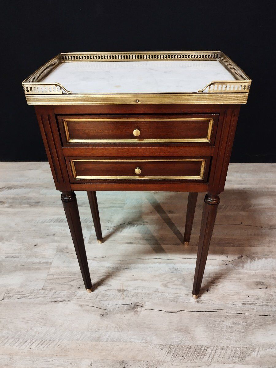 Pair of Louis XVI style bedside tables in mahogany