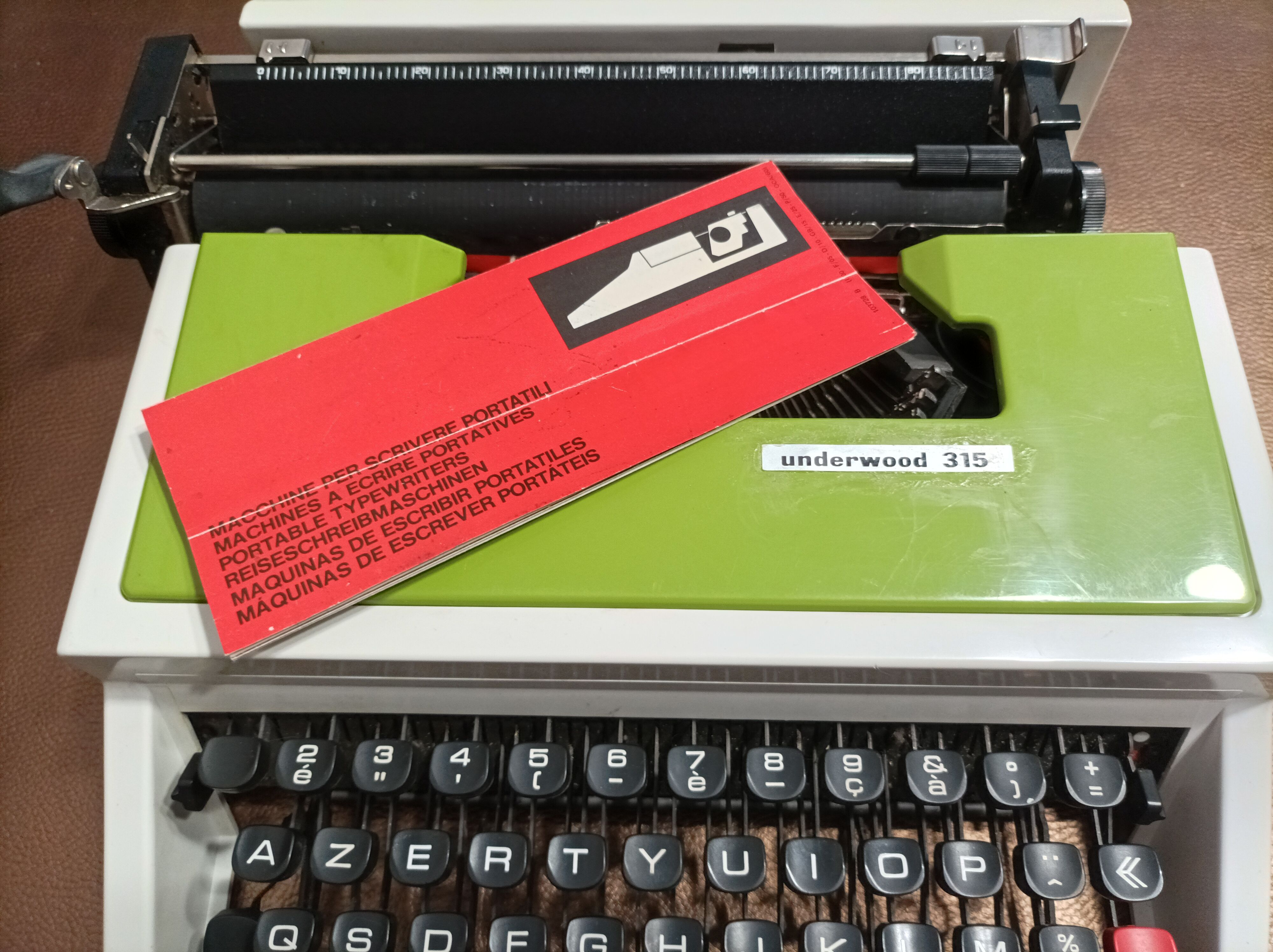 Green Underwood 315 typewriter with its briefcase