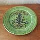 Green earth dish with a pattern from the manufacture Saint Jorioz Annecy
