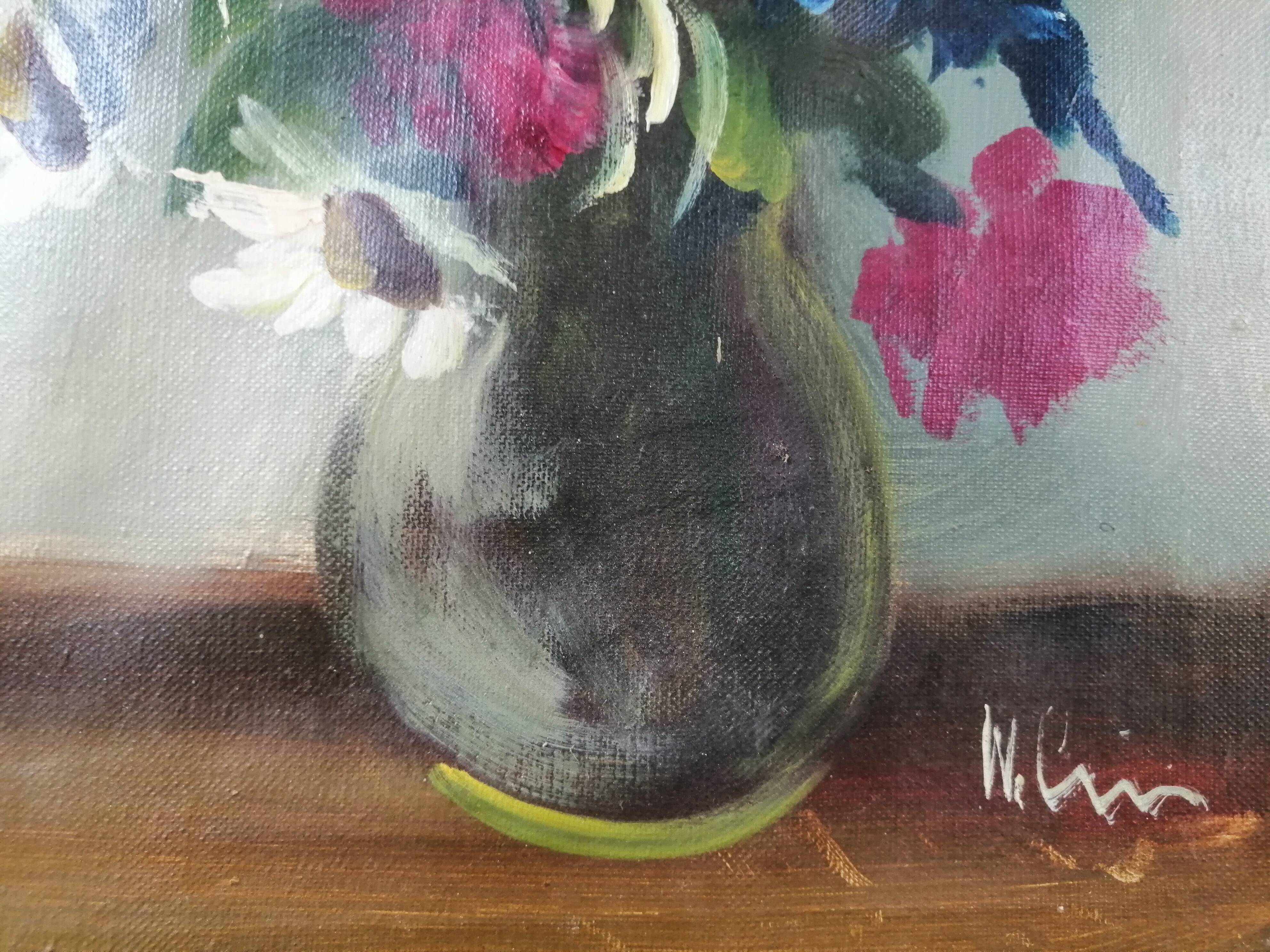 Still life with daisies and flowers in vase