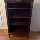 Directoire style bookcase in mahogany, decorated with gilded bronze.