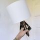 Pair of ceramic lamps in free-form triangle shape