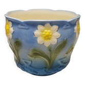 Très beau pot de fleur de couleur bleu et blanc doux avec des motifs floraux.