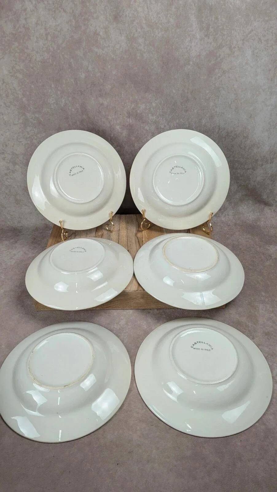 Set of 6 vintage blue Castellania deep plates.