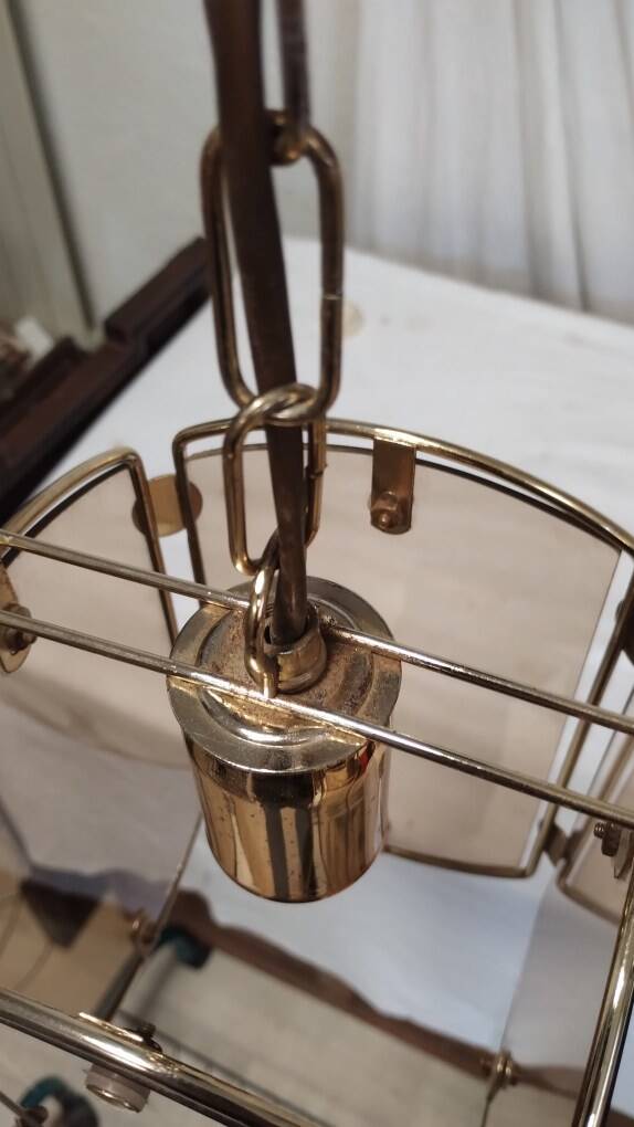 Suspension in gold metal and smoked glass