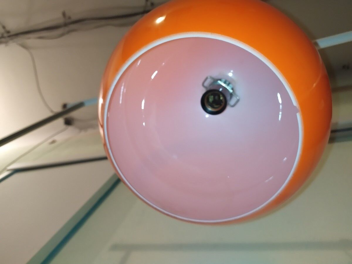Suspension lamp in orange glass