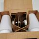 Old bathroom lamp with brown/golden ceramic base, porcelain socket and milky white glass
