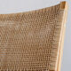 Reclining armchair in natural wood and woven rattan