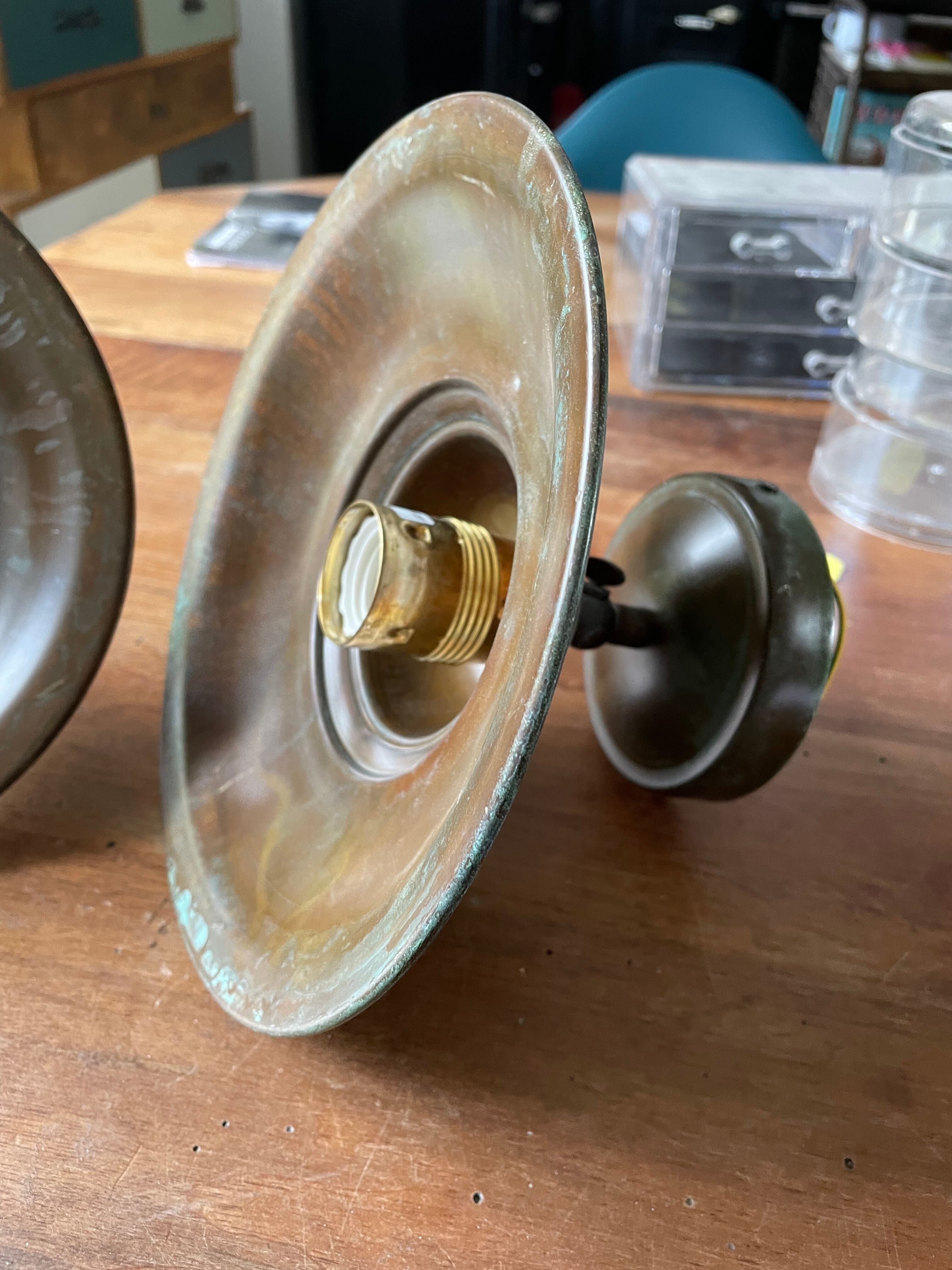 Pair of industrial brass wall lamps