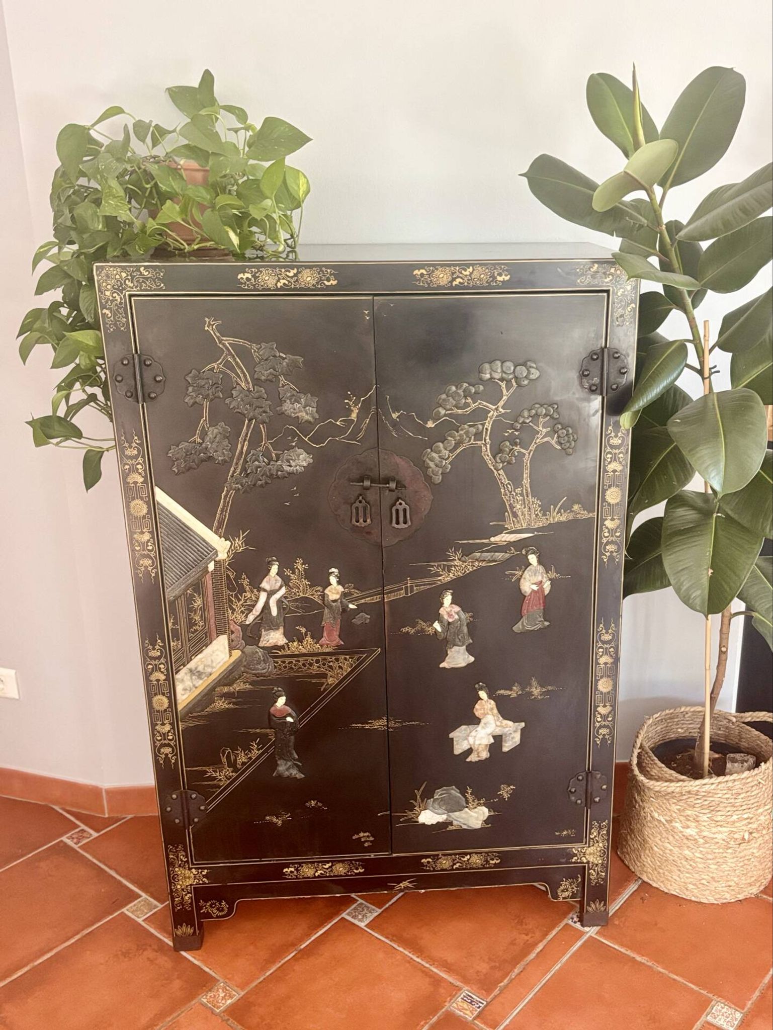 Magnificent black and gold lacquered Chinese cabinet.