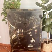 Magnificent black and gold lacquered Chinese cabinet.