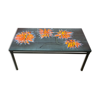 Vintage coffee table ceramic tray decorating orange flowers on grey background
