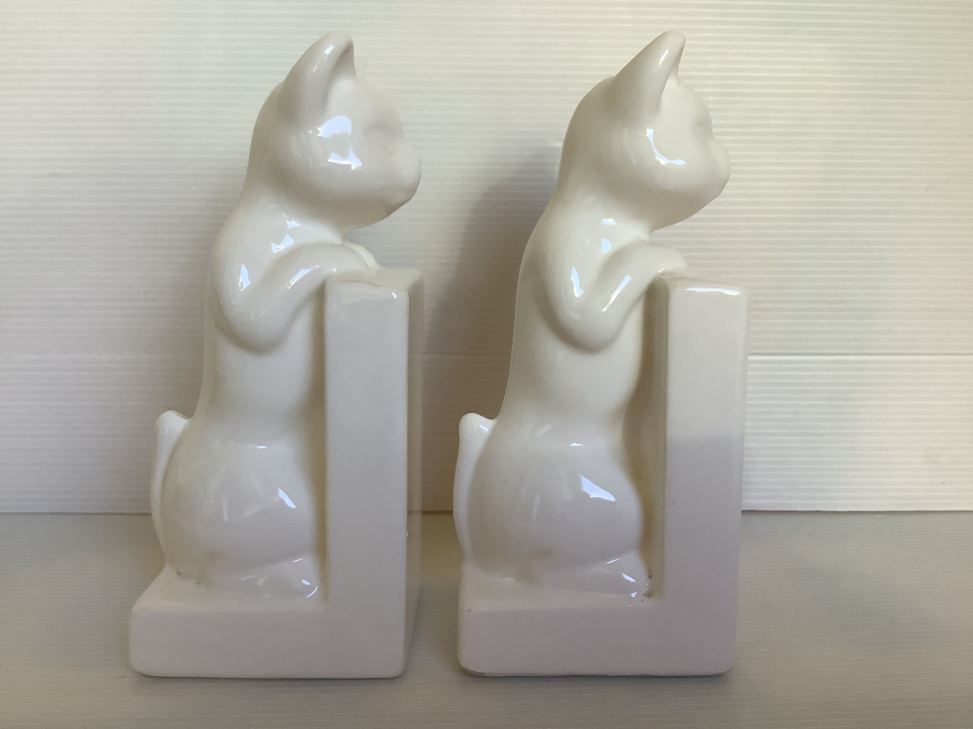 Pair of greenhouse books cats white earthenware