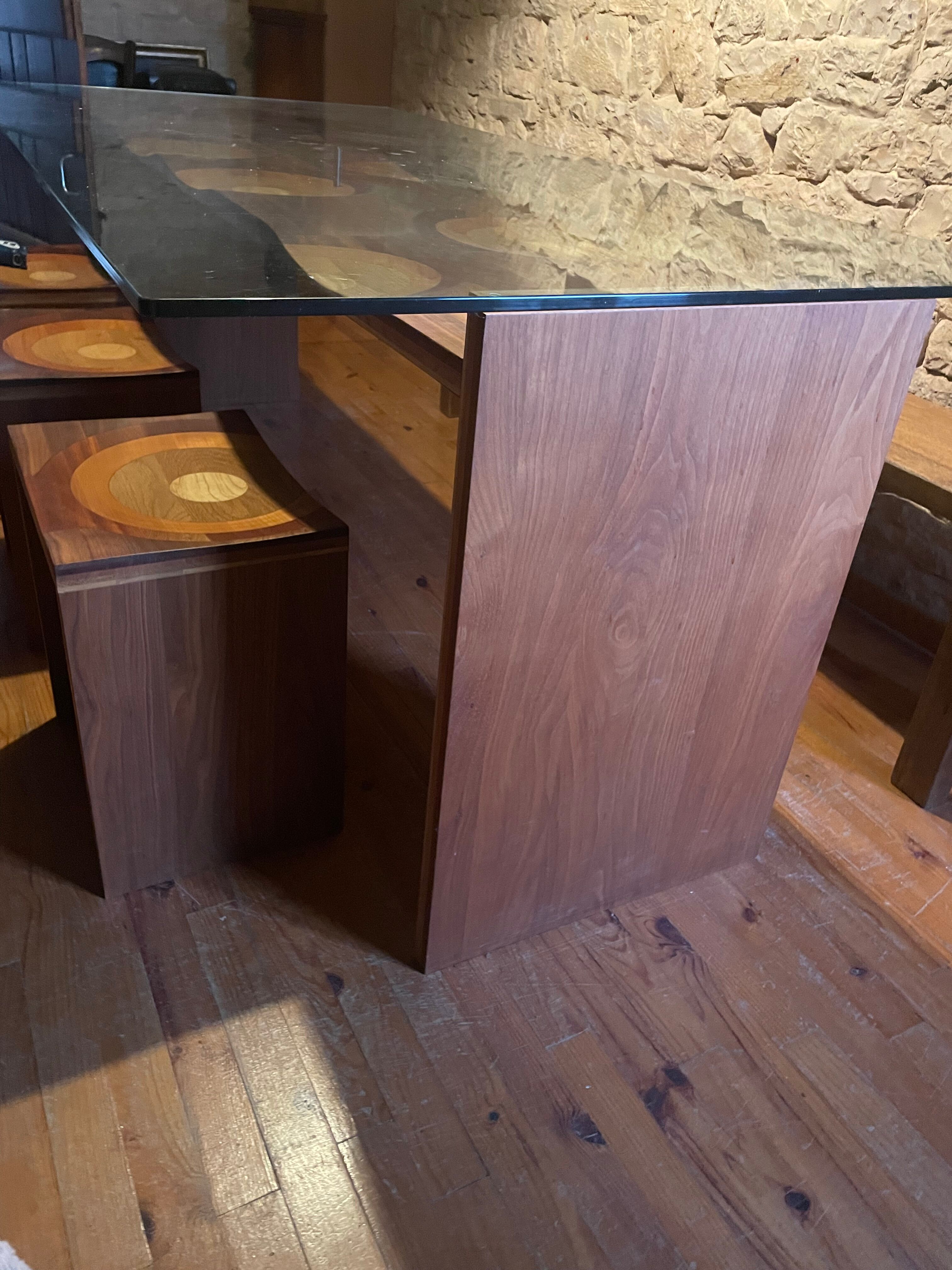Dining table and 3 Ripples stools by Toyo Ito.