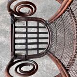 Mid-century Manou dark brown bamboo armchair with open rattan backrest, 1960s French