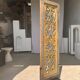 Rectangular Indonesian construction element with blue and yellow plant in carved wood