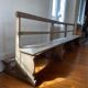 Very large church bench in patinated raw oak