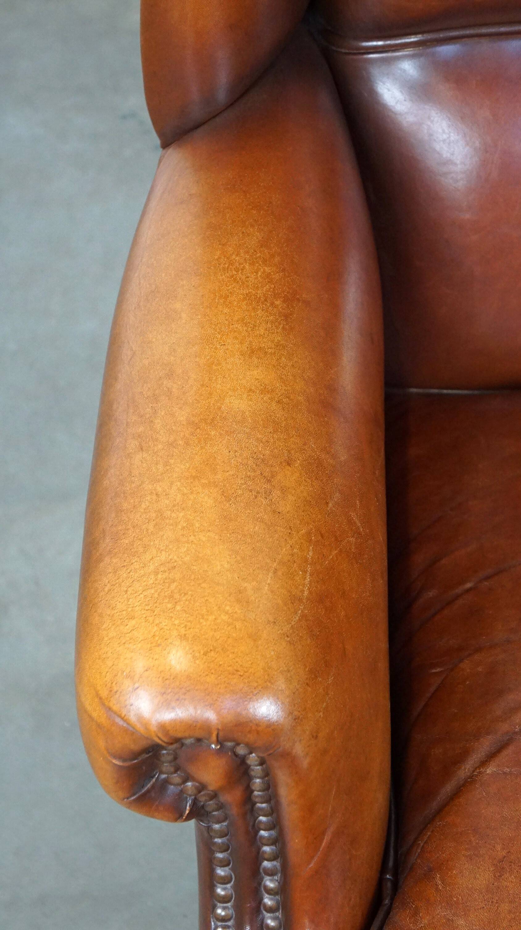 Beautiful and Comfortable Sheepskin Wingback Armchair with a Wonderful Patina