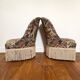 Pair of antique tapestry toad armchairs