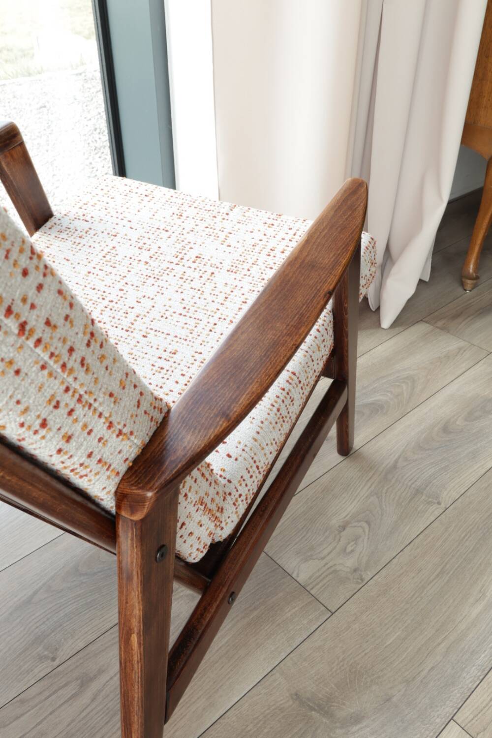 Vintage Danish boucle armchair with orange polka dots from the 1960s.