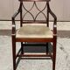 English Sheraton-style mahogany dining room set from the 20th century.