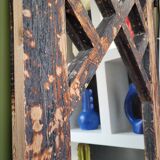 Wooden mirror mounted on old door