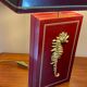 Pair of table lamps in Bordeaux lacquered wood and brass seahorse