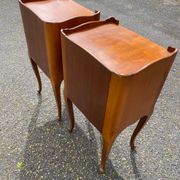 2 Louis XV bedside tables made of curved solid wood with drawers.
