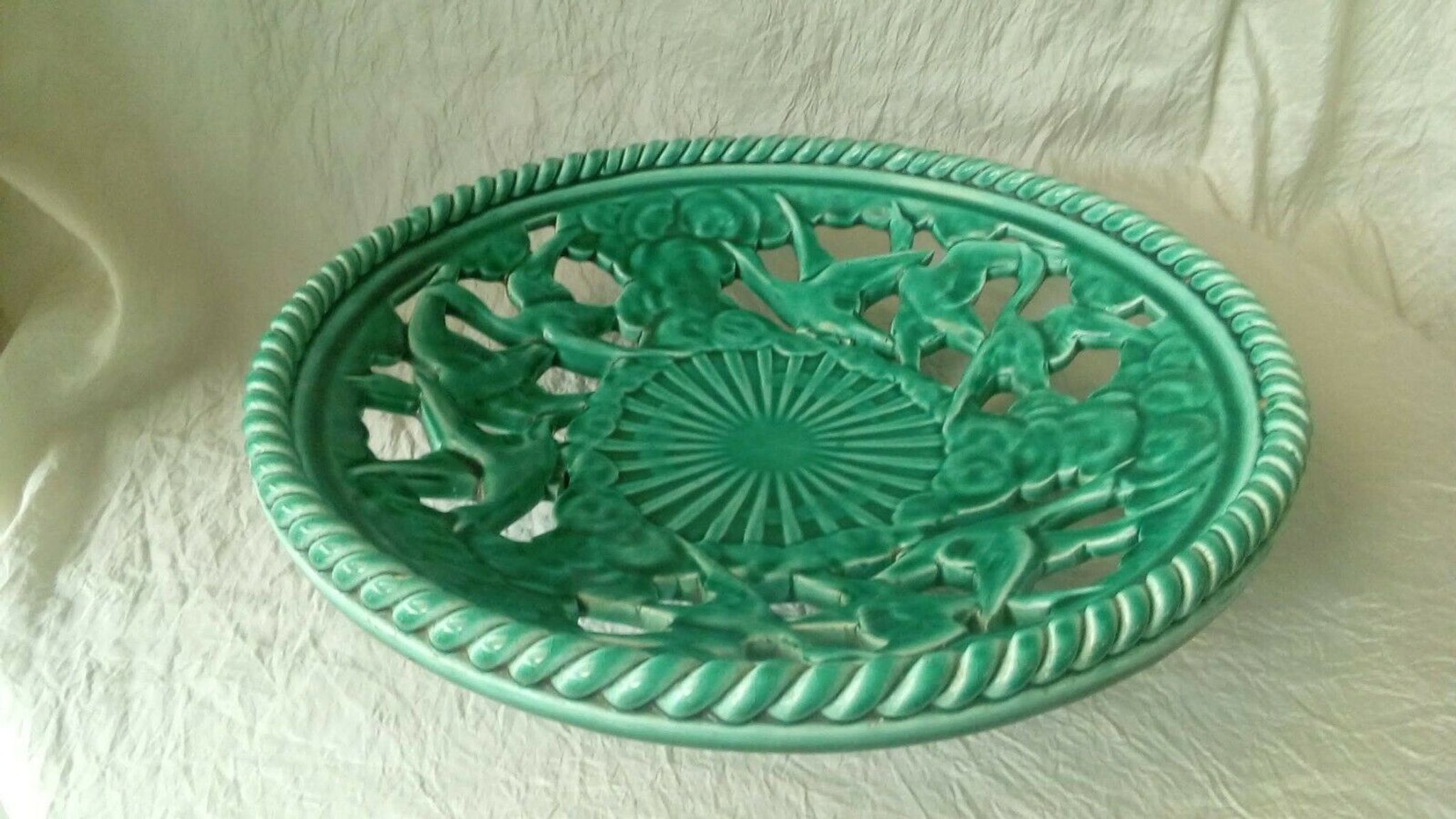 Twisted and pierced ceramic fruit bowl with a duck motif from the 1950s.