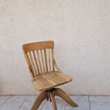 Swivel office chair in blond oak circa 1930