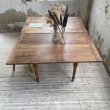 Walnut farmhouse table with swivel and extendable top