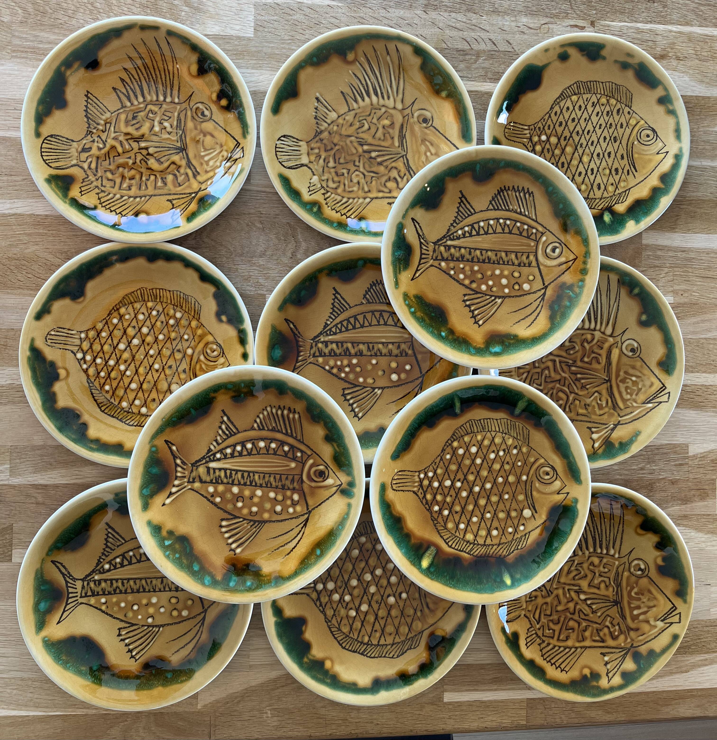 Ensemble de 12 assiettes de la série "Poisson" de Longchamp