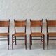 Four teak dining chairs with patinated cane after Gio Ponti, Italy 1960s