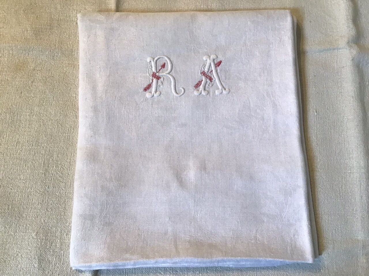 Square linen tablecloth marked RA